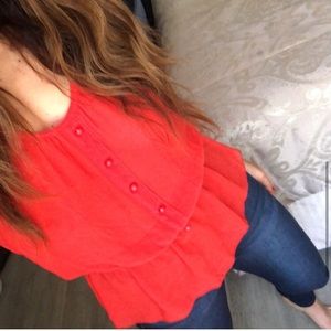 Bright/sheer sleeveless tunic in orange/red color